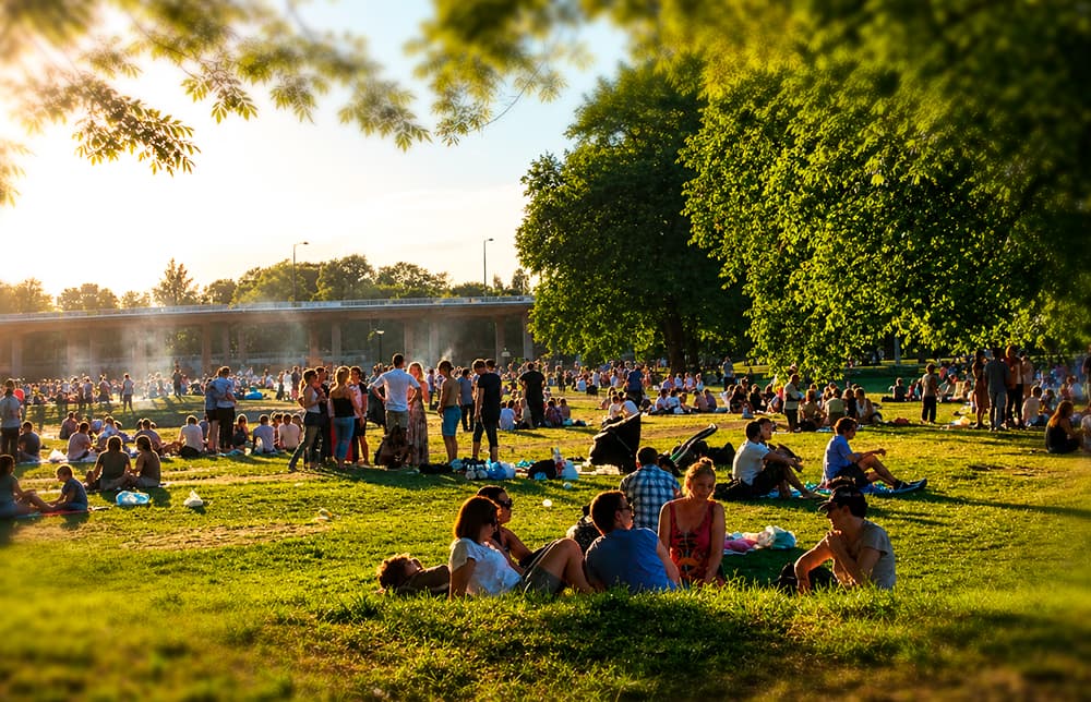 Rålambshovsparken packed with young people celebrating Midsommar in summer